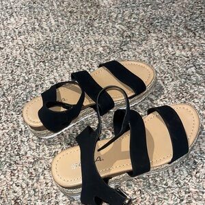 Black Soda sandals , slight heel . kids size 3 but fit me as a women’s 5.